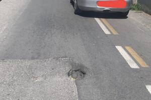 Buca profonda e pericolosa in Via Pisa a Marina di Massa: Benedetti e Rivieri chiedono maggior manutenzione stradale